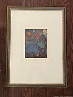 Full view of framed lithograph with mat and frame