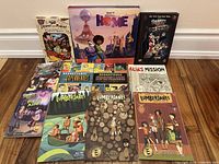 All eleven books laid out showing front covers