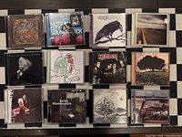 Front covers of all twelve CDs displayed in three-by-four grid