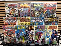 Front covers of all 13 bagged comics displayed on rack