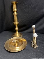 Tall candlestick, chamberstick, wall hook front view