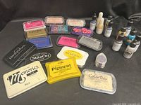 All ink pads, re-inker bottles and dauber grouped