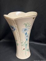 Angled front view of Lenox Morningside Cottage vase showing floral motif, gold rim, ladybug accent
