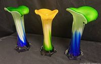 Front view of all three gradient art glass vases