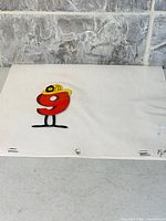 Full view of animation cel showing number 9 character on sheet