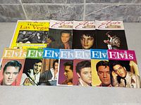 All 11 items laid out showing covers