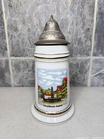 Front view showing Schwäbisch-Gmünd transfer print and pewter lid