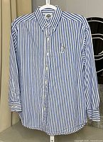 Front view of striped Bugs Bunny shirt hanging