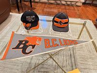 Caps and pennant displayed together