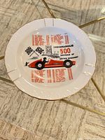 Front view showing race car graphic, text and winners list