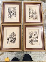 All four framed prints arranged together