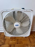 Front view of white Super 22-inch box fan with grille