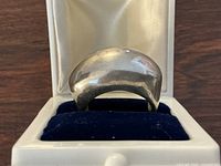 Sterling silver domed ring displayed in presentation box