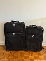 Both Skyway suitcases standing side by side
