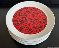 Stack of Madrid dinner plates showing pattern and quantity