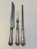 Three-piece Birks carving set laid out