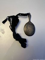 Miniature sterling silver mirror with ribbon