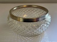 Overall view of cut crystal bowl with sterling rim