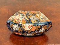 Top/front view of Imari style porcelain lidded box
