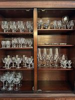 Cabinet view showing majority of stemware groups across three shelves