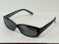 Front angled view of full pair of sunglasses
