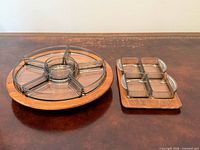 Circular teak lazy Susan and rectangular teak platter with glass inserts