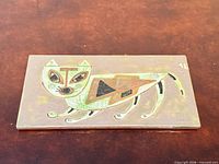 Full view of rectangular tile showing entire cat design