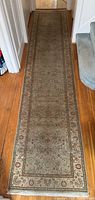 Full length view of hallway runner rug
