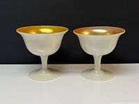 Full view of both Steuben sherbet glasses side by side