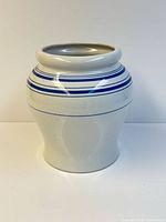Front view of Royal Doulton blue-banded utensil holder