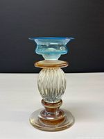 Full view of candlestick holder showing overall design and colors