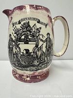 Full jug profile showing transfer print and lustre glaze