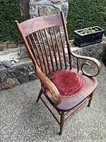 Full view of bentwood armchair with cushion