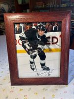 Front view framed autographed photo