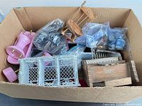 Box containing assorted miniature furniture and accessories