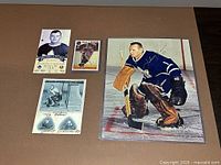 Front view of four hockey memorabilia items