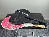 Three branded covers (HEAD, Slazenger, Wilson) stacked showing overall lot