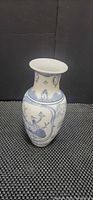 Full view of blue and white porcelain vase front