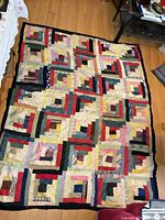 Full view of quilt showing overall pattern and colours