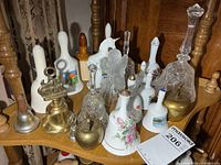 Shelf with entire assortment of mixed-material bells