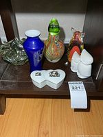 Group shot of all six decorative items on shelf