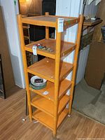 Full view of orange resin five-shelf rack