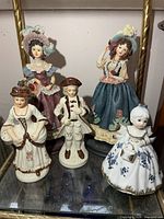 All five figurines grouped together