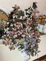 Group of four glass flower bonsai arrangements