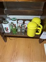 Shelf view showing entire assortment of shakers