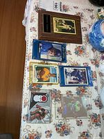 Group view of plaque and five card cases