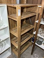 Full view of five-tier wooden shelf unit