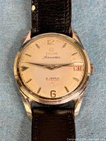 Front view of watch showing dial details and condition