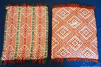Both pillows front view showing full patterns and fringes