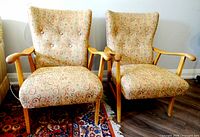 Front view of both matching vintage armchairs